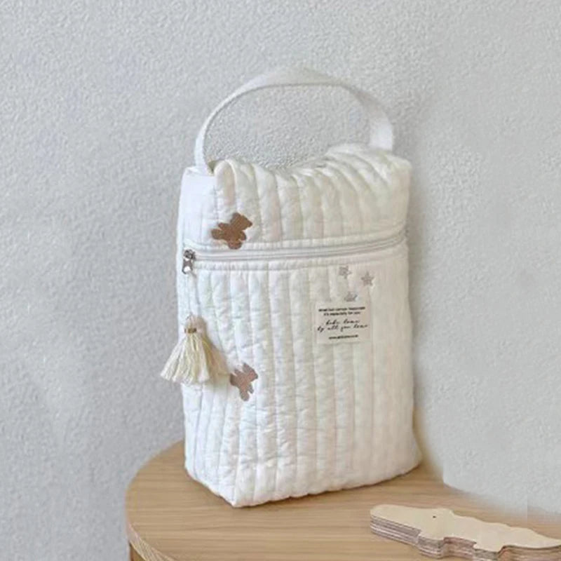 Bolsa de pañales portátil para cochecito.