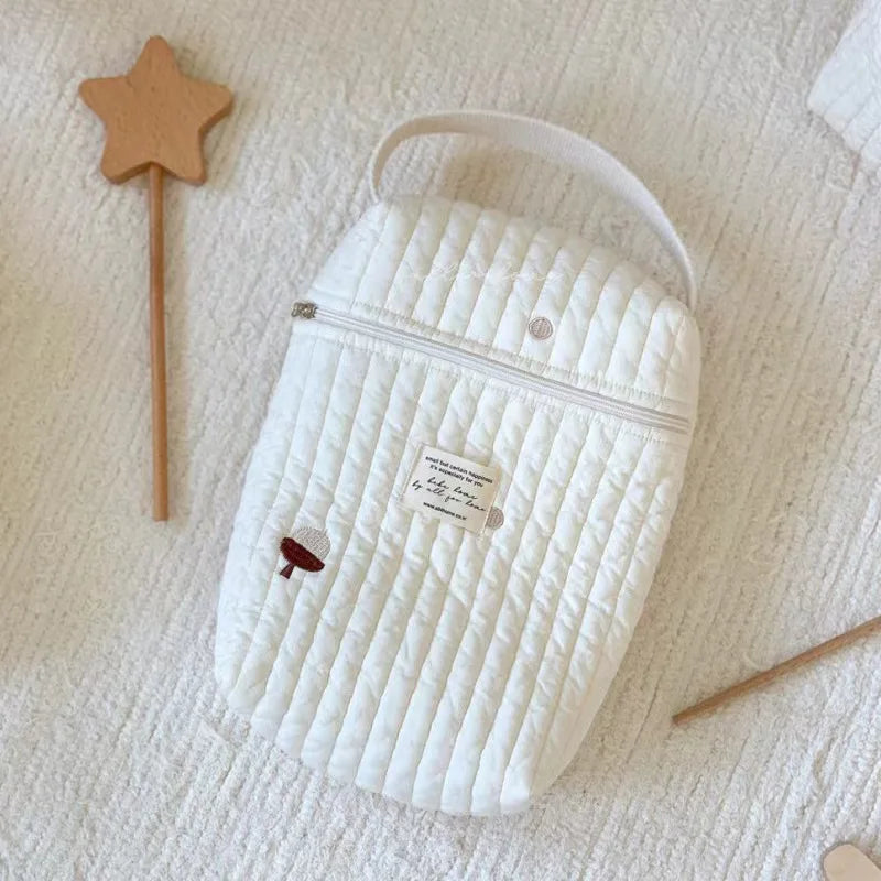 Bolsa de pañales portátil para cochecito.