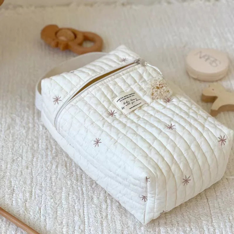 Bolsa de pañales portátil para cochecito.