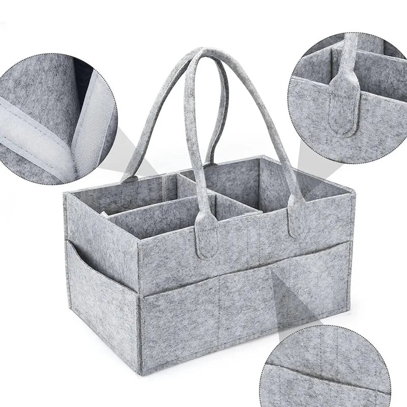 Cesta organizadora gris de artículos para bebé