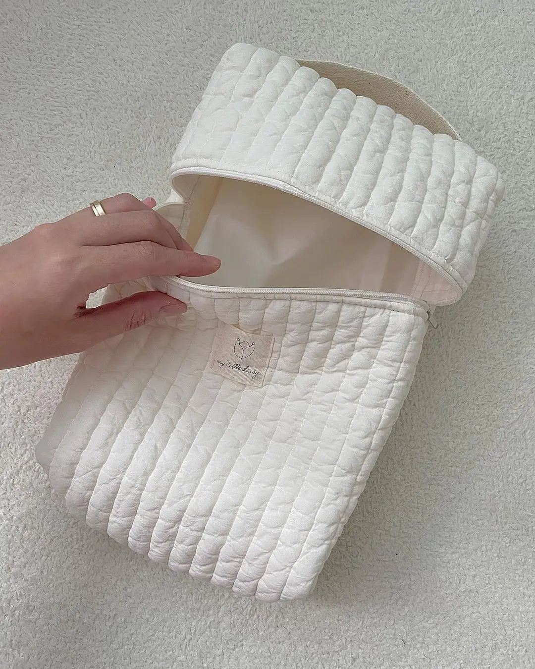 Bolsa de pañales portátil para cochecito.