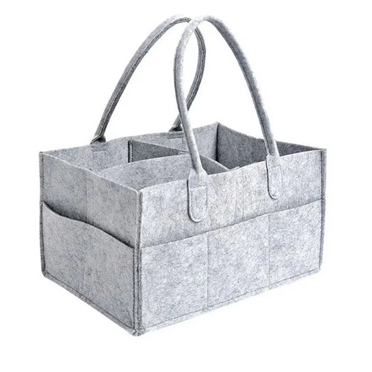 Cesta organizadora gris de artículos para bebé