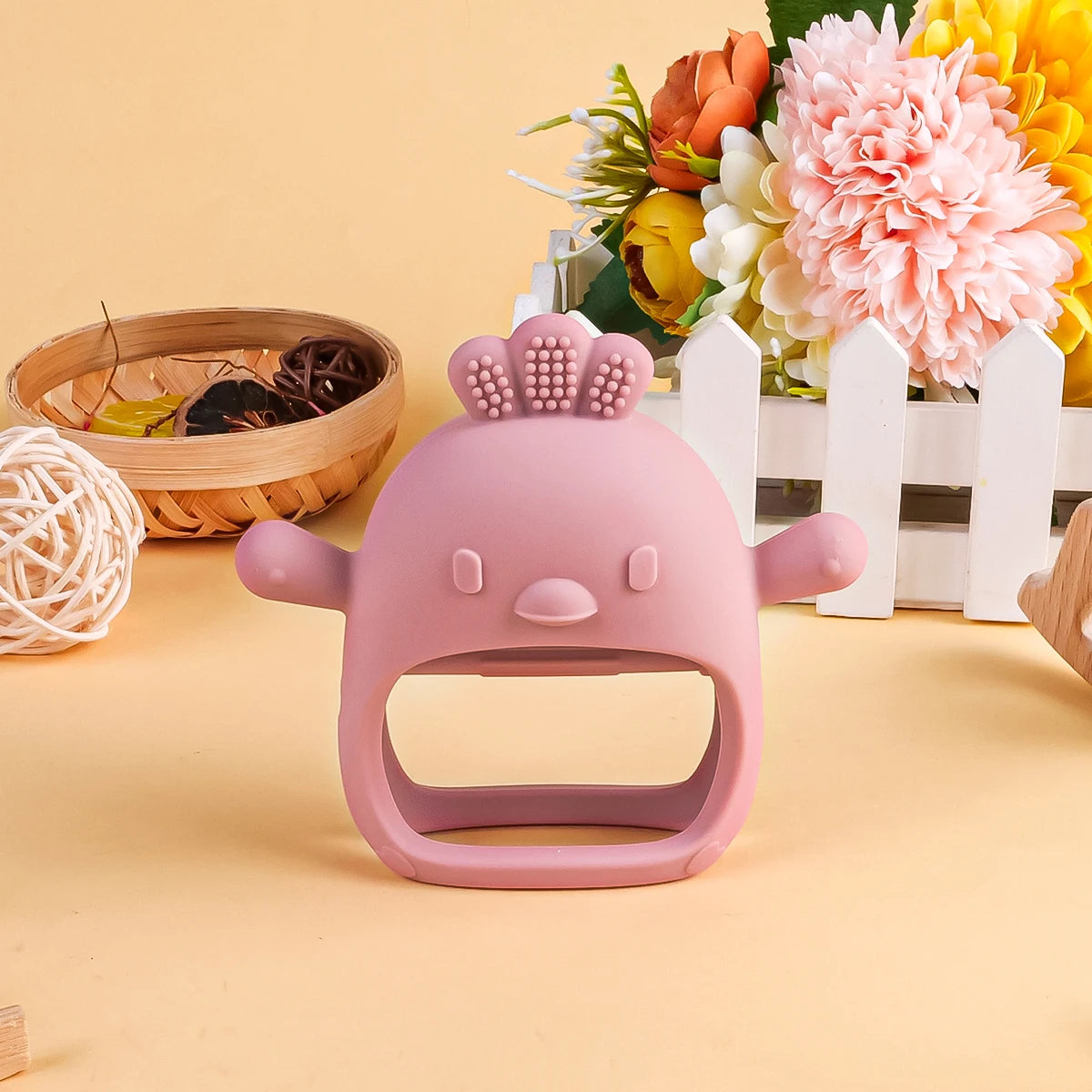 Mordedor de bebé con forma de pollito